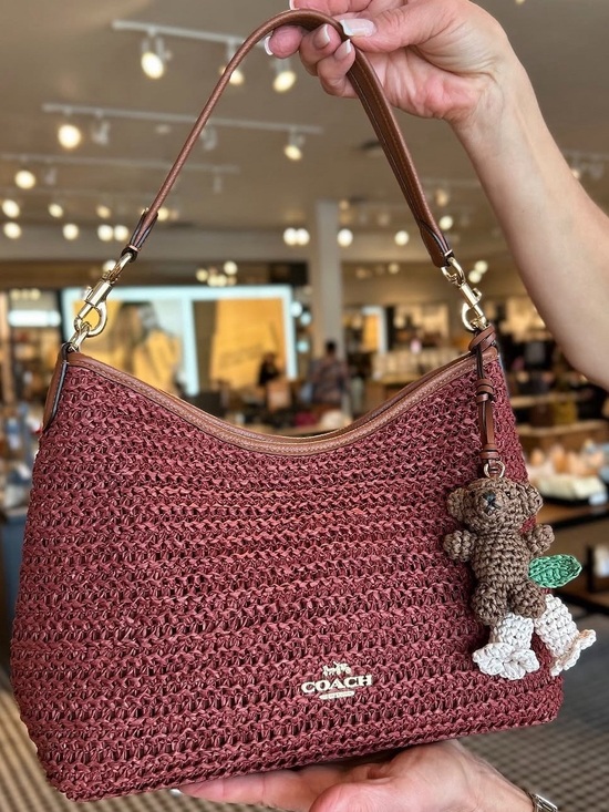 Coach Handbags - NWT Coach Laurel Shoulder Bag
With Charms